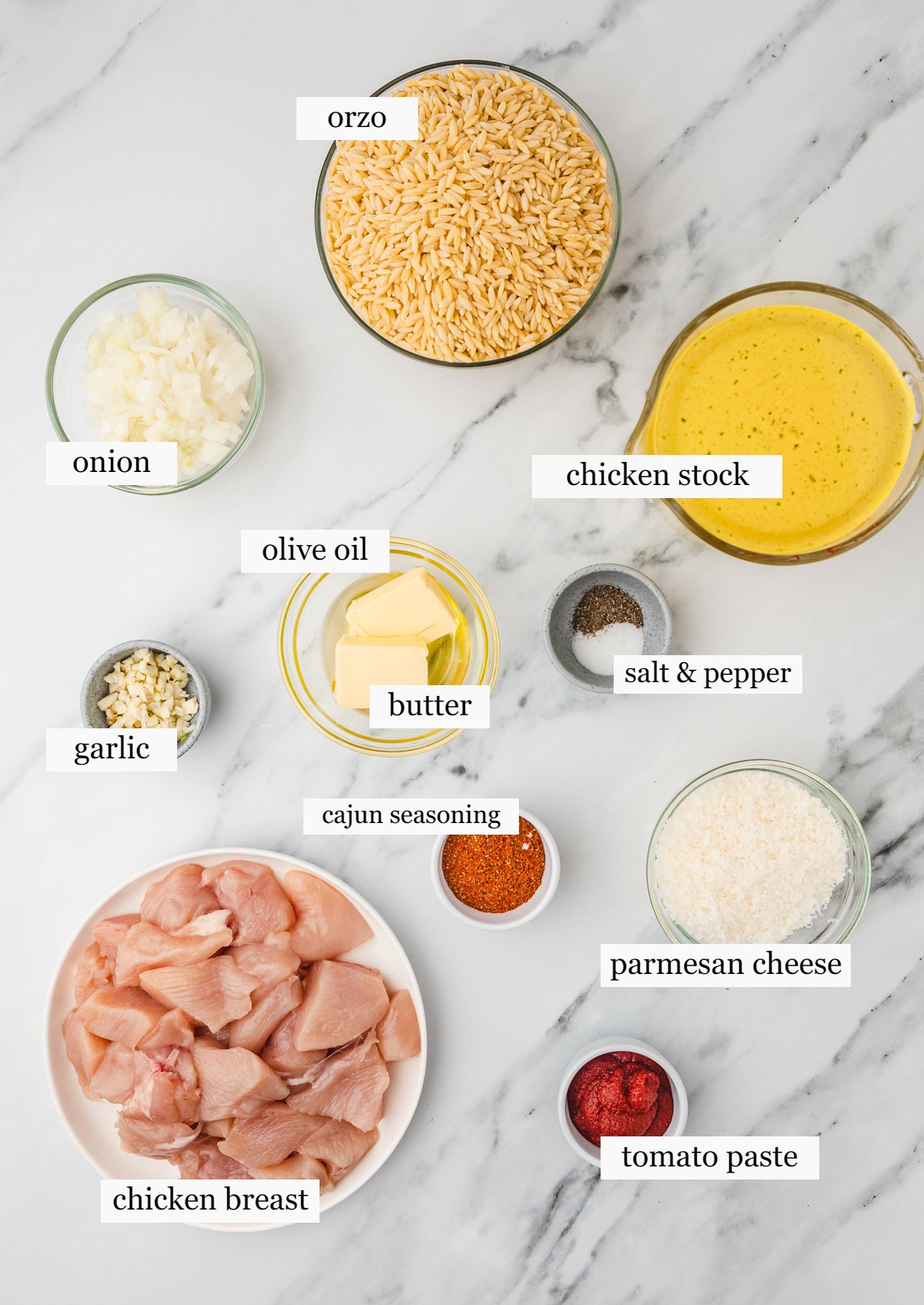 ingredients laid on a white marble surface.