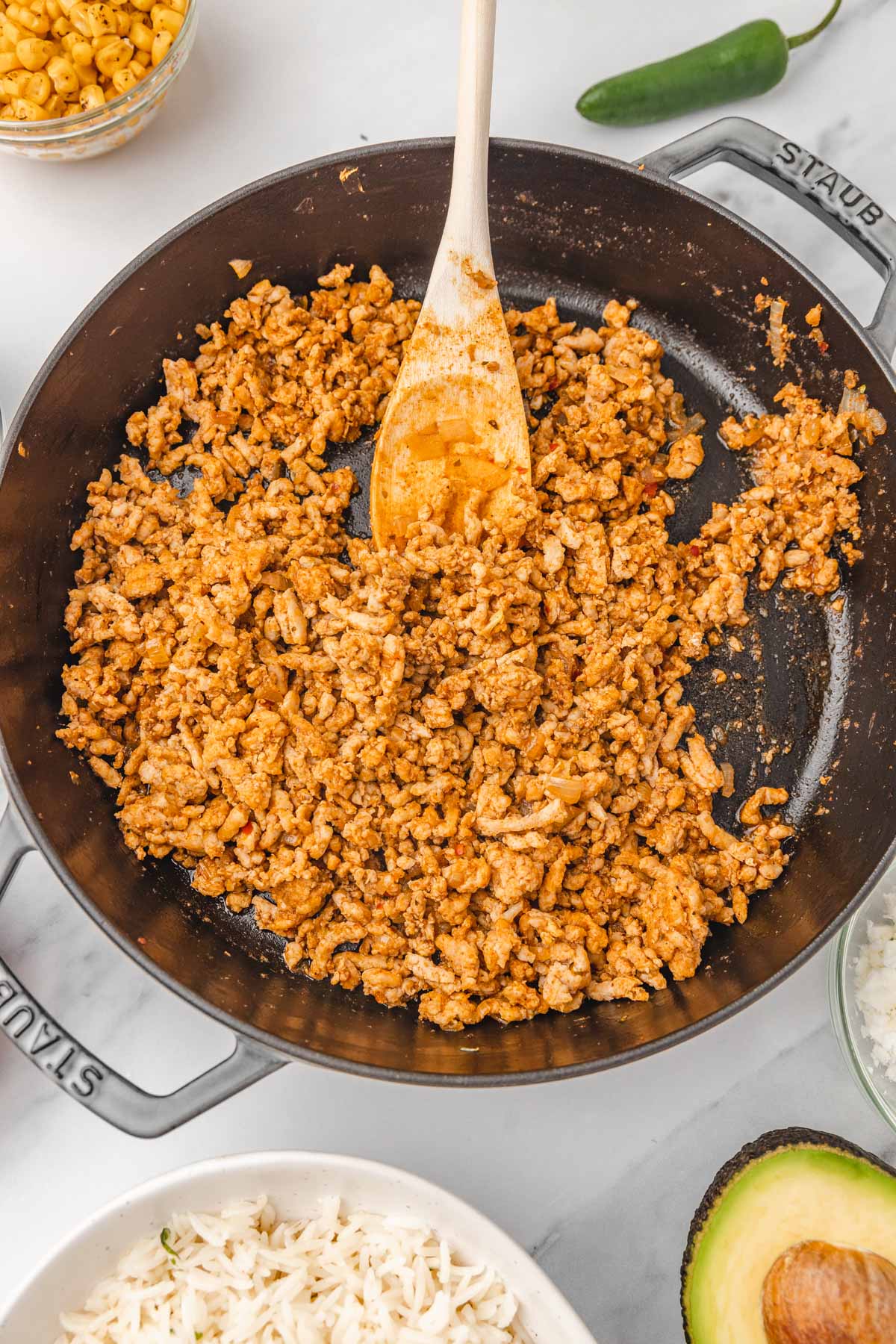 ground chicken in a cast iron skillet.