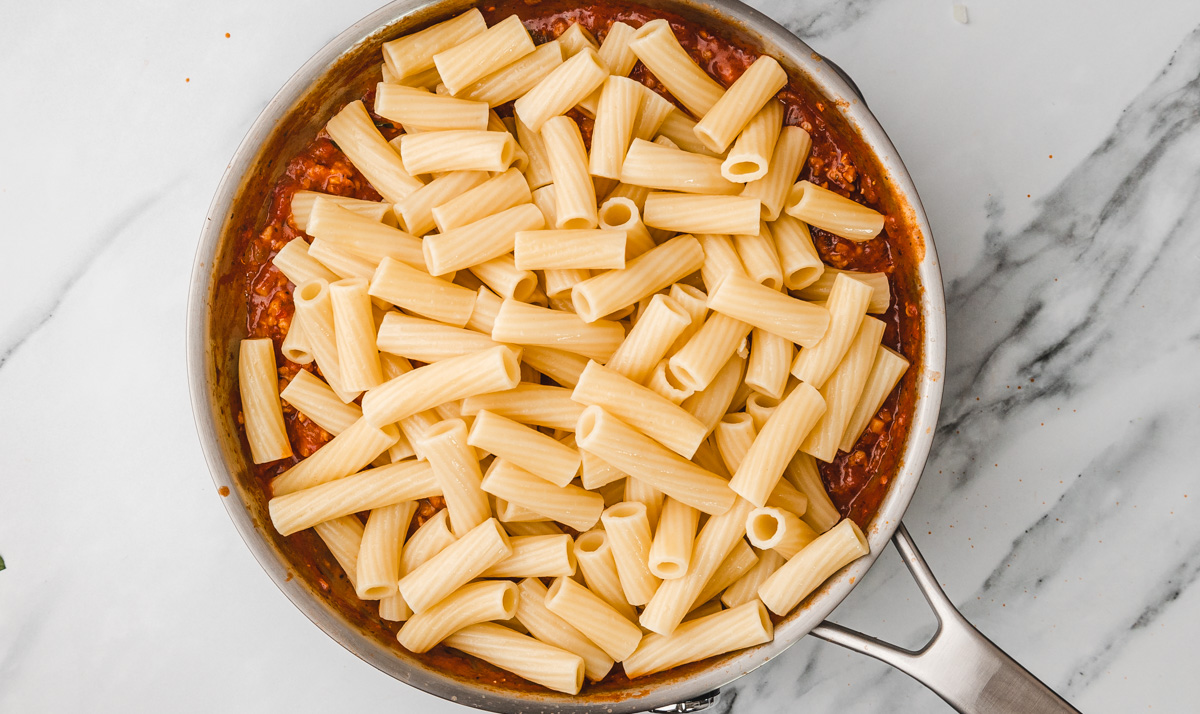 cooked pasta in a skillet.