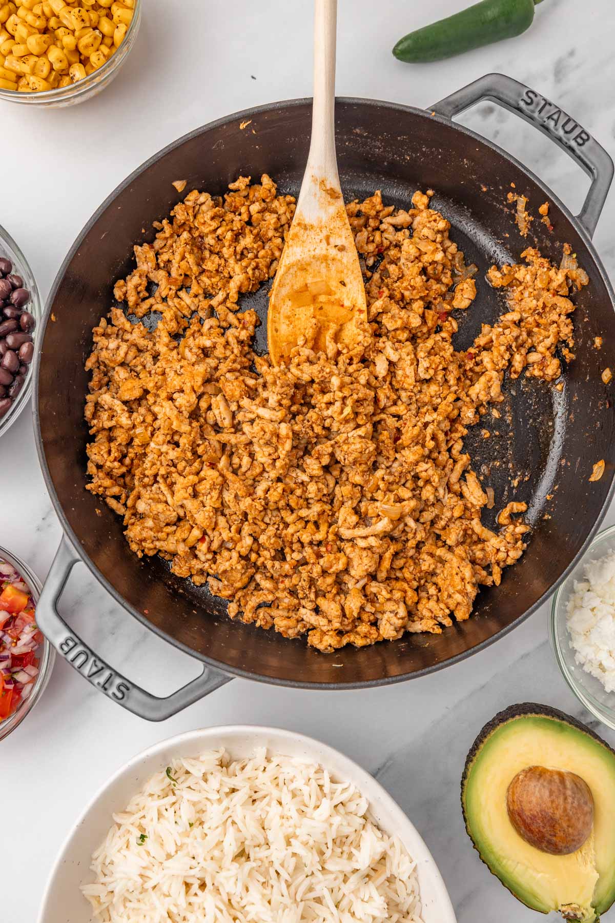 ground chicken taco in a skillet.